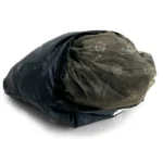 USGI Skeeta Tent Mosquito Net partially removed from its nylon storage pouch, showing its compact and packable design.