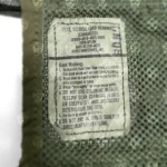 Military-spec label on the U.S. Military LBV II vest, showing NSN 8415-01-296-8878 and manufacturer details.